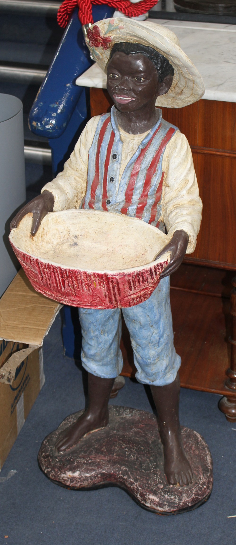 A composition figure of a black boy standing holding a boy, H.98cm